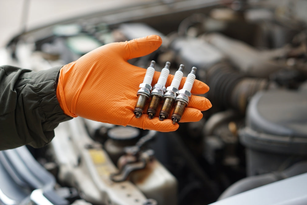 Aftermarket Spark Plugs vs OEM: Complete Performance and Longevity Comparison