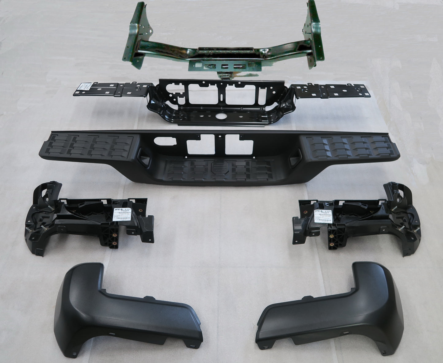 1103 | 2016-2019 TOYOTA TACOMA Rear bumper assembly w/Towing Hitch; w/o Parking Assist; Black; see notes | TO1103128|5215904030-PFM